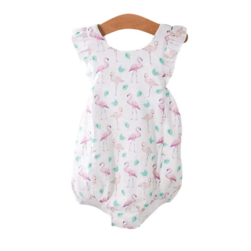 Baby romper with flamingo pattern on a white background