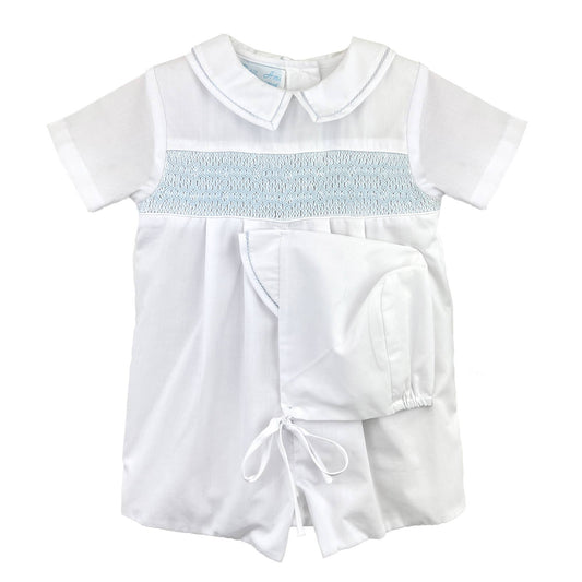White baby romper with light blue smocking on a white background