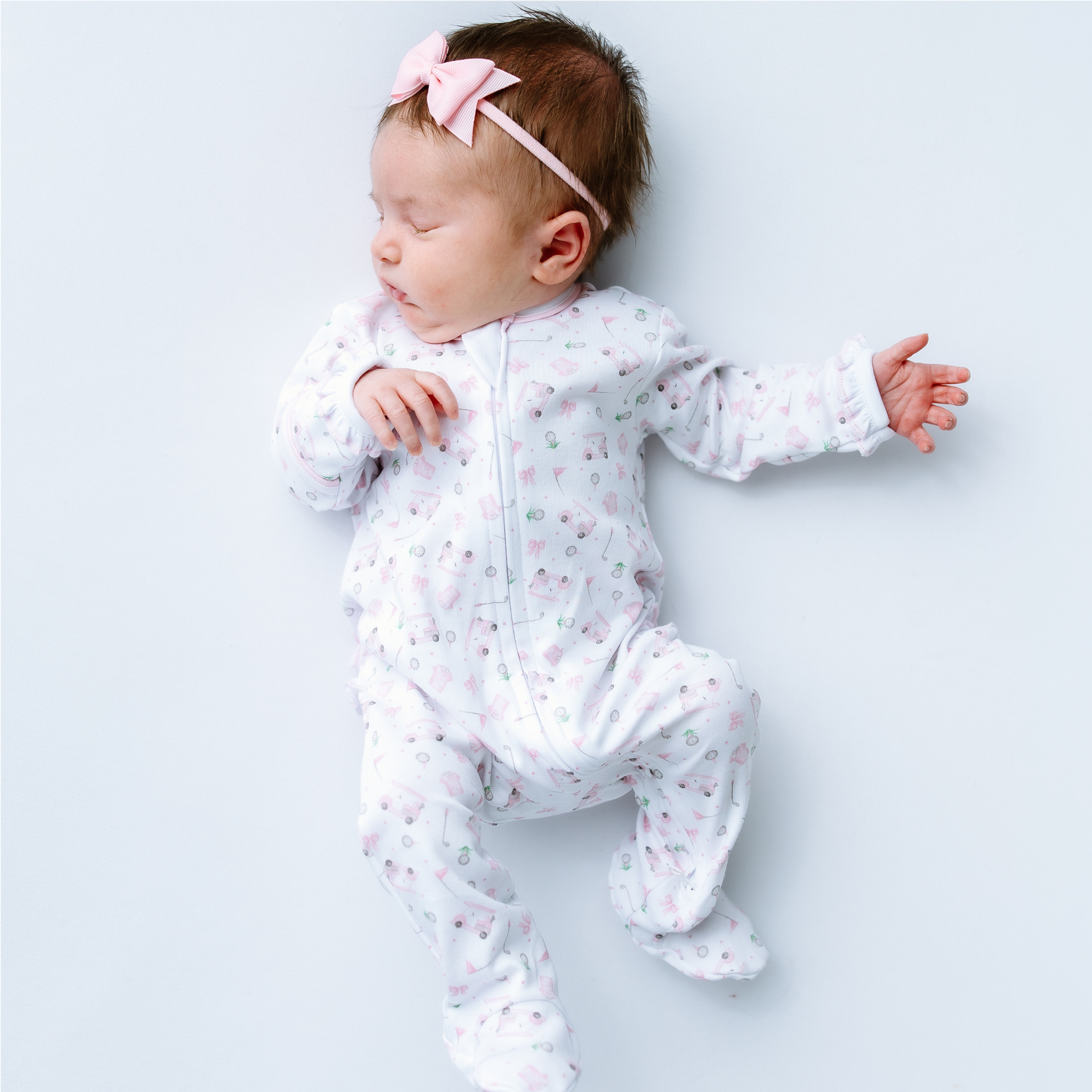 Little Golfer Print Ruffle Zip Footie - Pink Magnolia Baby