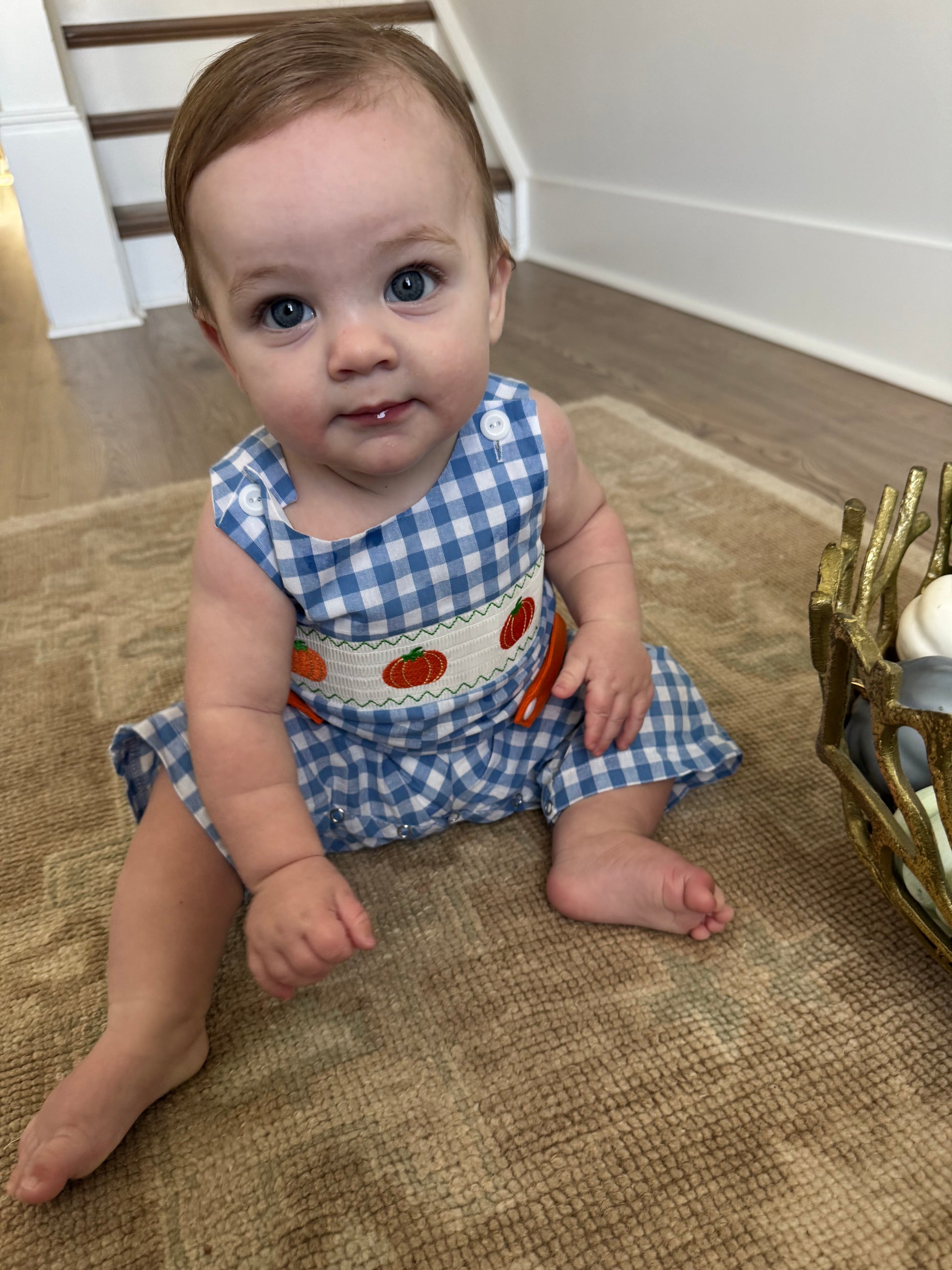 Baby in a blue pumpkin thanksgiving Longall gingham blue. Boys outfit for fall