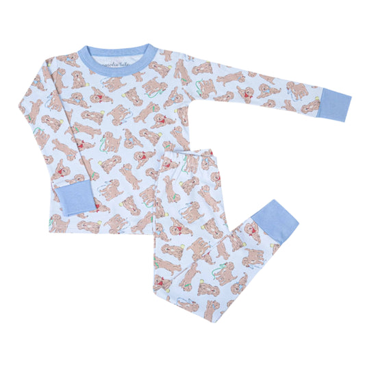 Children's pajama set with golden retrevier pattern on a white background