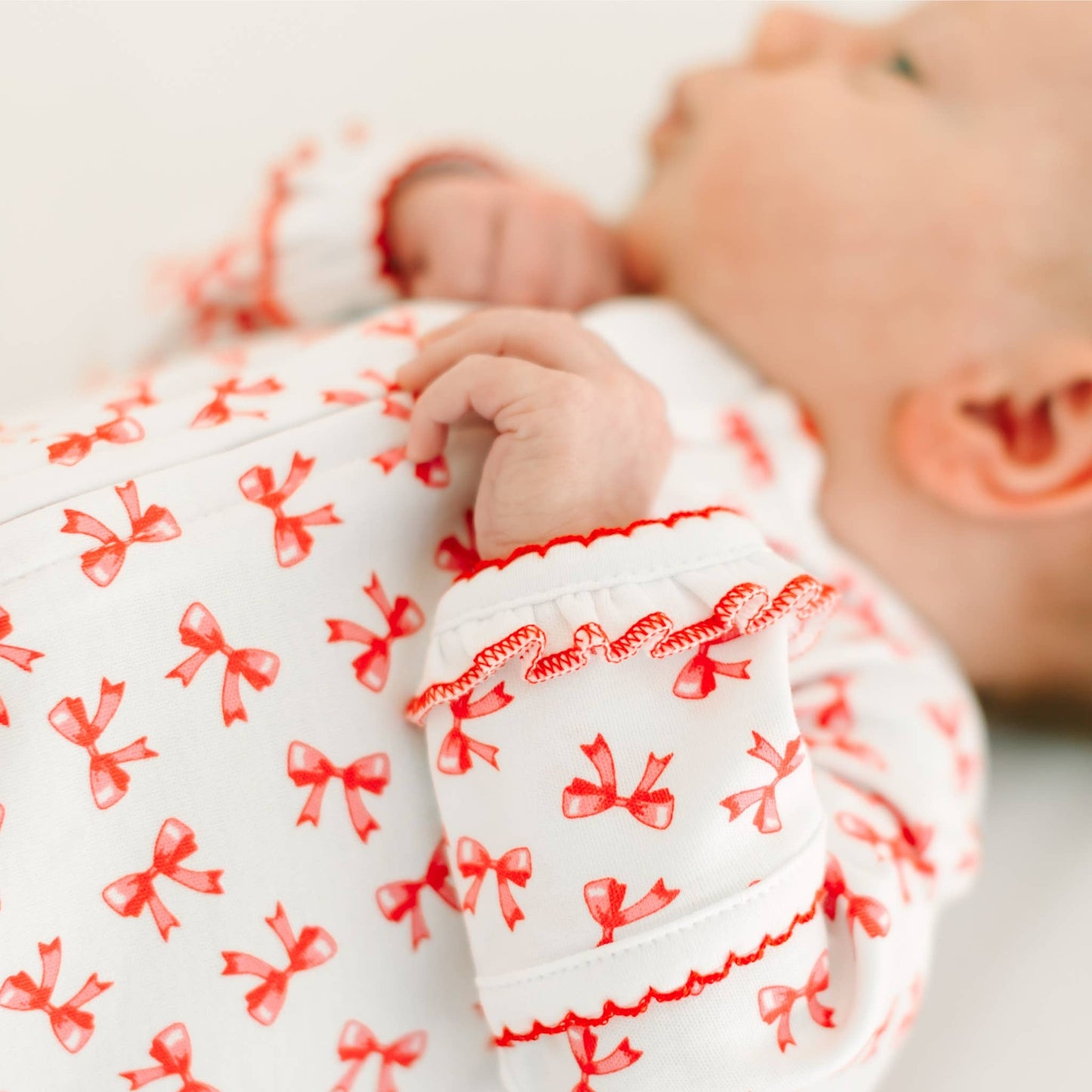 Scarlett Bows Print Zip Footie Magnolia Baby